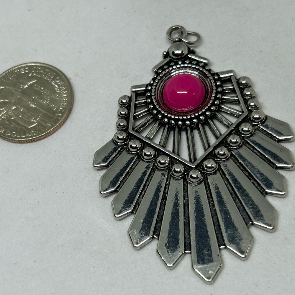 Silvertone Starburst‎ Design Pendant with Pink Gem